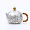 wholesale Pure 999 Fine Silver Handcrafted Silver Teapot with Intricate Floral Engravings and Amber-Toned Handle - Handicraft-0-0