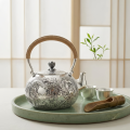 wholesale 999 Pure Silver Dragon Embossed Teapot With Rattan Wrapped Handle-0-1