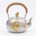 wholesale Pure 999 Fine Silver Handcrafted Hammered Silver Tea Kettle with Dragon Relief and Traditional Rattan Handle - Handicraft-0-0