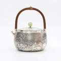 wholesale Pure 999 Fine Silver Handcrafted Silver-Tone Teapot with Landscape Relief, Arched Wood Handle, and Jade Finial - Handicraft-0-0