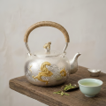 wholesale Pure 999 Fine Silver Handcrafted Hammered Silver Tea Kettle with Dragon Relief and Traditional Rattan Handle - Handicraft-0-2