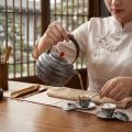 wholesale Pure 999 Fine Silver Handcrafted Hammered Silver Teapot with Woven Rattan Handle and Red Bead Finial - Handicraft-0-1