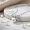 wholesale 925 Sterling Silver Elegant Pearl Pendant Necklaces Wholesale with Sparkling Zircon Bow Design - JewelryODM-0-2