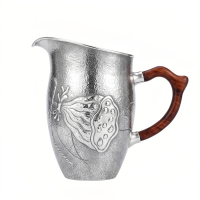 wholesale Pure 999 Fine Silver Handcrafted Hammered Silver Pitcher With Lotus Seed Pod Relief And Wooden Handle - Handicraft-undefined