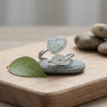 wholesale 925 Sterling Silver Elegant Pear-Shaped Blue Gemstone and Diamond Halo Leaf Bypass Ring - JewelryODM-0-2