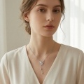 wholesale 925 Sterling Silver Elegant Silver Butterfly Necklace with Iridescent Wing and Teardrop Charms - JewelryODM-0-1