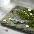 wholesale 925 Sterling Silver Elegant S925 Sterling Silver Bracelet with Green Jade Ring and White Floral Charms - JewelryODM-0-3