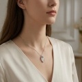 wholesale 925 Sterling Silver Elegant Silver Necklace with Carved White Jade Leaf Pendant and Sparkling Foliage Accents - JewelryODM-0-2