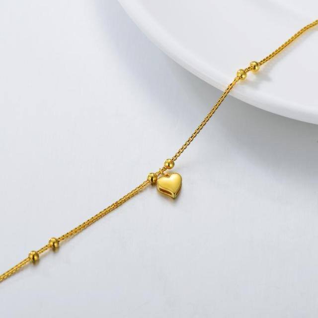 Bracelet en or 18K avec pendentif en forme de cœur et de perles-2