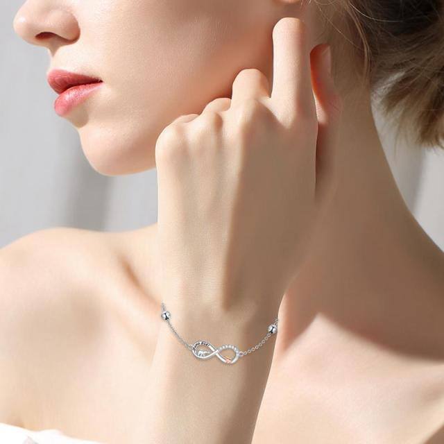 Sterling Silver Two-tone Circular Shaped Cubic Zirconia Polar Bear & Infinity Symbol Pendant Bracelet-1