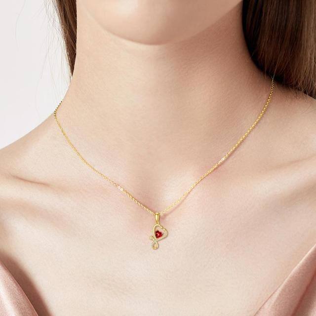 Collar de oro de 14 quilates con corazón de circonita cúbica y colgante estetoscopio-1