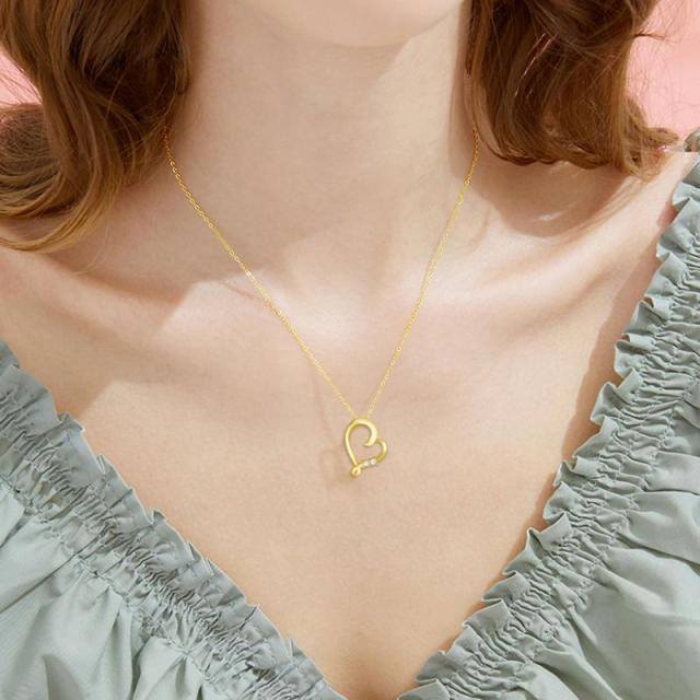 Collier en or 9K avec pendentif en forme de cœur en diamant-1