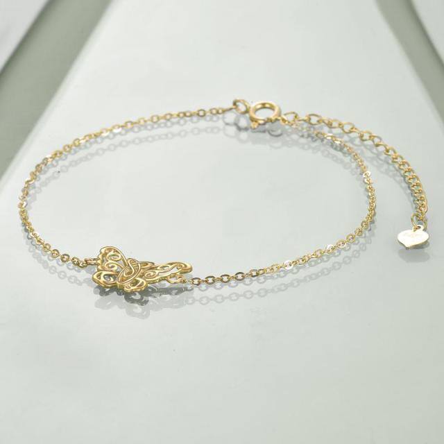 Bracciale con ciondolo a farfalla e nodo celtico in oro 14K-4