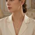 wholesale 925 Sterling Silver Exquisite Double Gourd Necklace Wholesale Featuring Emerald and Shimmering White Stones - JewelryODM-0-3