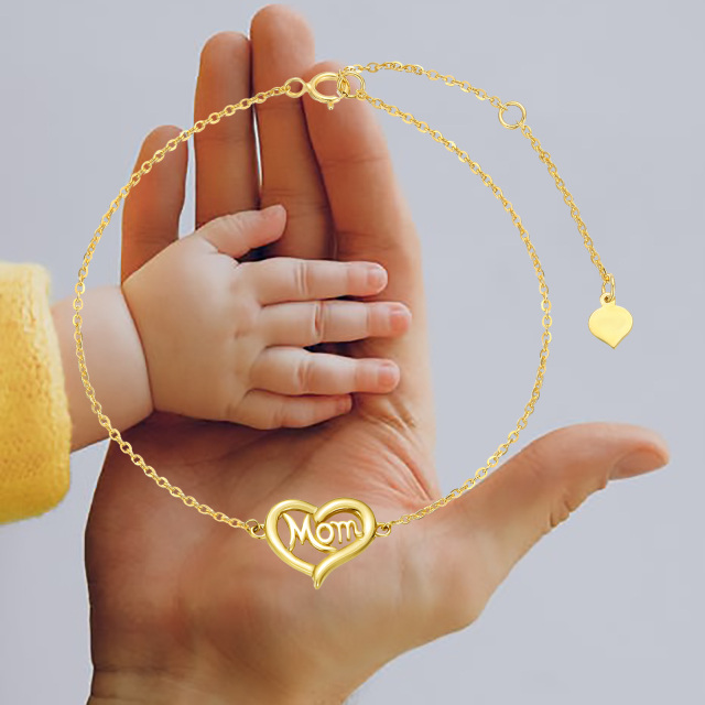 Pulsera de oro de 14 quilates con colgante de corazón y palabra grabada-1