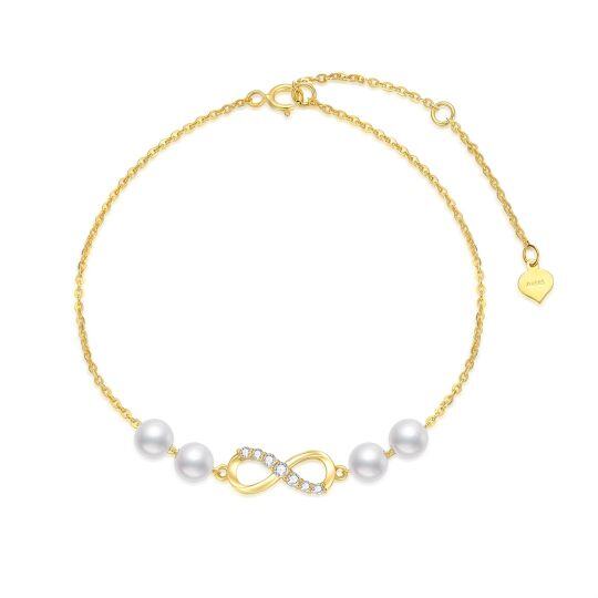 Pulsera con colgante de símbolo infinito de perlas y diamantes de oro de 10 quilates