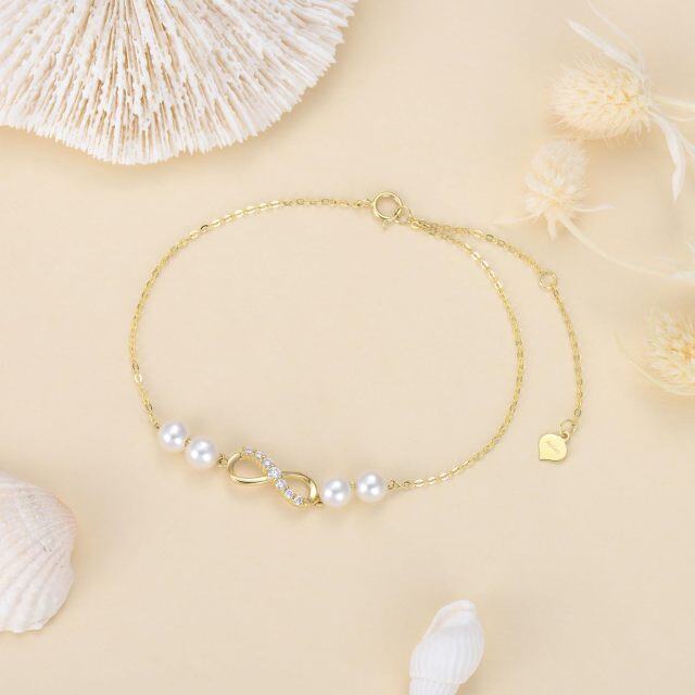10K Gold Diamond & Pearl Infinite Symbol Pendant Bracelet-2
